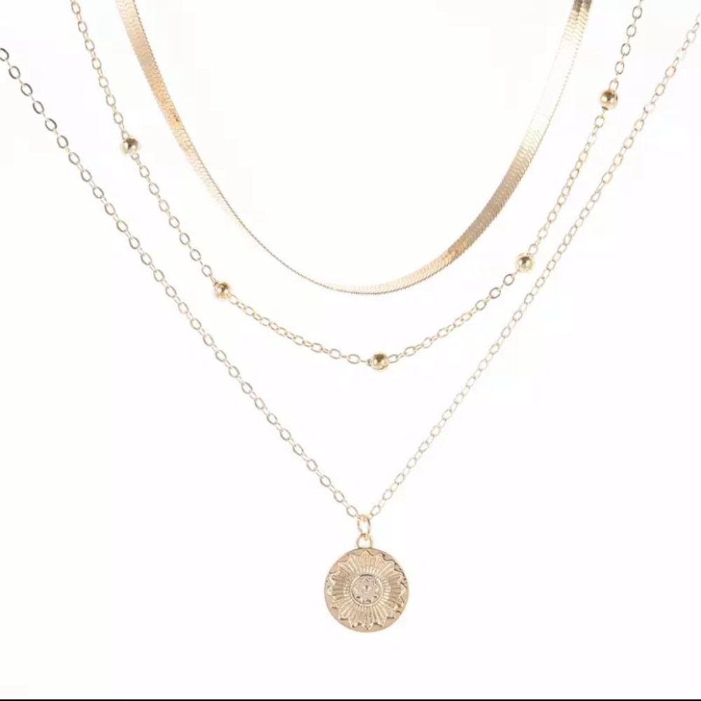 Gold herringbone choker and coin pendant necklace